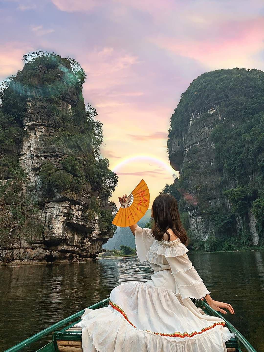 Longtail boat in tropical turquoise waters